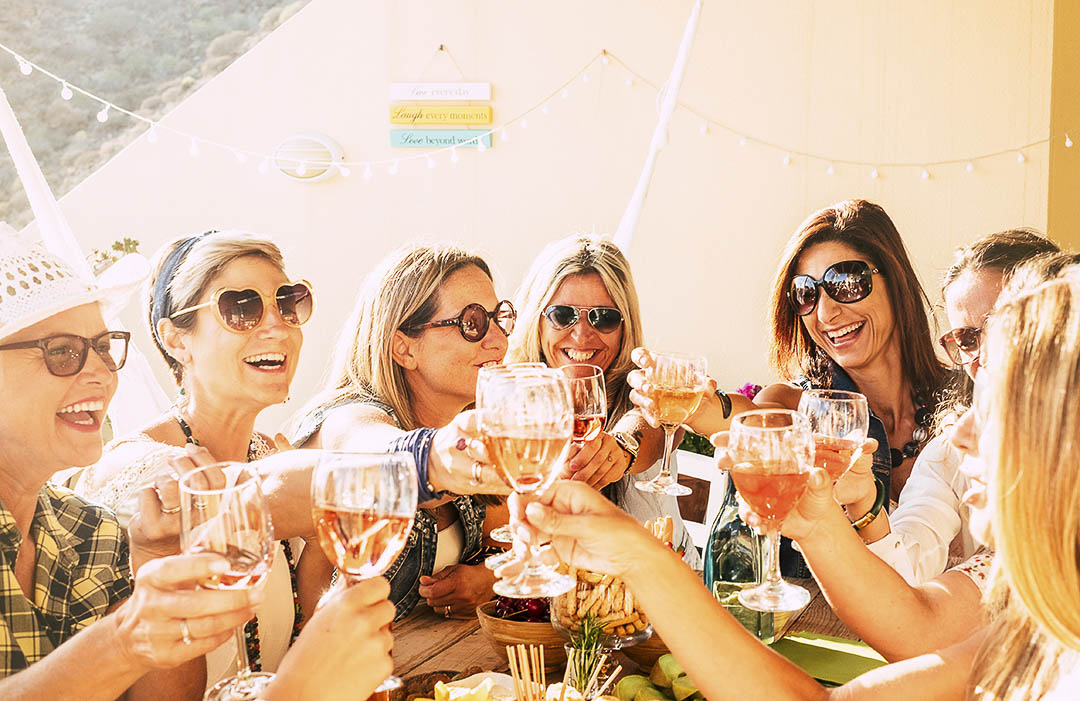 A Group of women enjoy each others company on a brunch