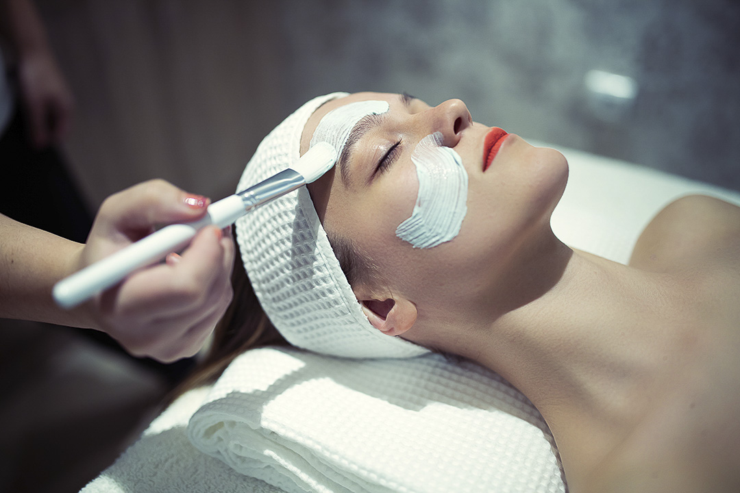 a women at a spa receiving a skin care treatment