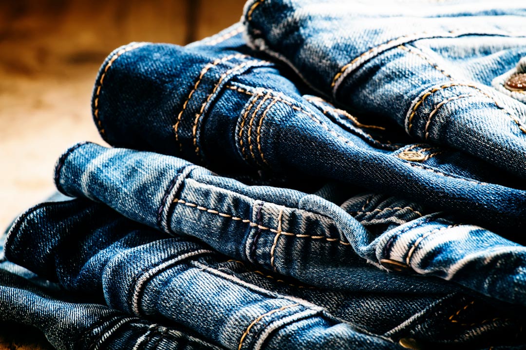 a pile of jeans